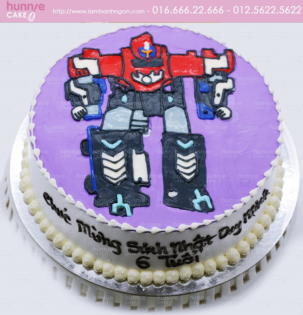 Hãy chiêm ngưỡng bánh sinh nhật Optimus Prime đầy màu sắc và phong cách. Đây sẽ là món quà tuyệt vời cho những fan hâm mộ Transformers và Optimus Prime. Bánh sẽ khiến bạn thích thú với đường nét tinh tế và chi tiết chân thực, giống như trong phim.